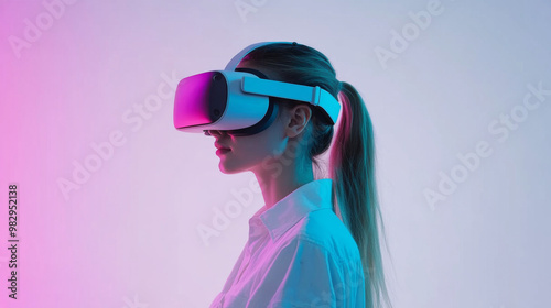 A woman wearing virtual reality headset is immersed in digital world, showcasing blend of technology and modern lifestyle. vibrant lighting enhances futuristic atmosphere photo