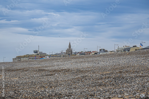 Pebble Beach, bathing boxes and cliffs in Dieppe in Seine Maritime department in the Normandy region of northern France.