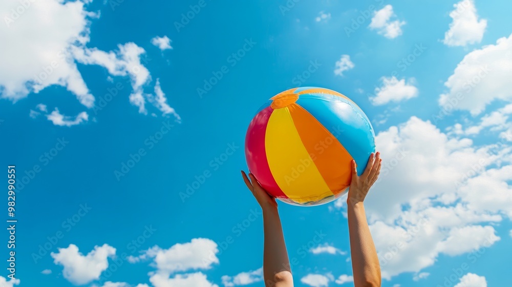 Summer Fun: Colorful Beach Ball Close-up Against Sunny Sky Summer Fun: Colorful Beach Ball Close-up Against Sunny Sky