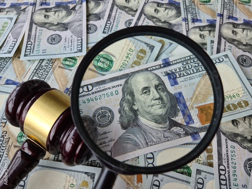 Photography A magnifying glass focuses on a Benjamin Franklin bill