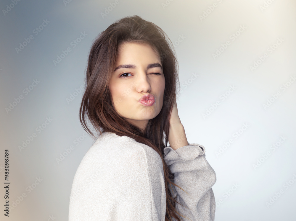 Fashion, portrait and girl in studio, pout and confident in mockup, haircare and treatment for hairdo. White background, model and woman with hairstyle, shampoo and texture in salon, wink and USA
