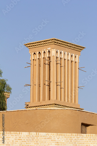 A wind catching tower, designed and constructed with adobes for cooling and ventilation purposes. Yazd, Iran. photo