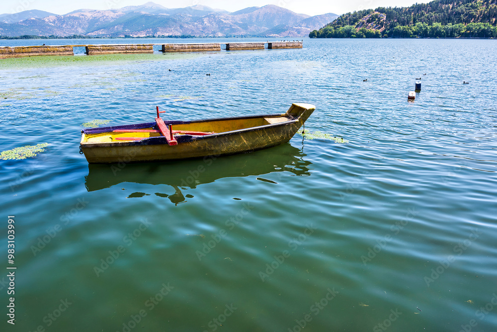 Boat Floating on Lake in Kastoria City Boat Floating on Lake in Kastoria City