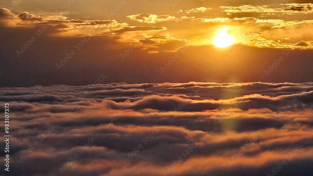 Obraz premium sunset over the clouds