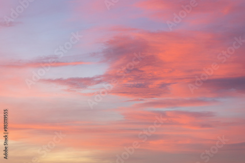 Wallpaper Mural The sky at sunset is a breathtaking blend of pink, orange, blue, red, purple, and yellow clouds, creating a serene and tranquil backdrop for any project Torontodigital.ca