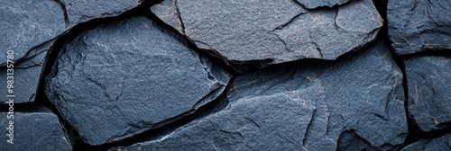  A tight shot of a cluster of stones, all composed of similar rock types The center showcases an arrangement of smaller stones photo