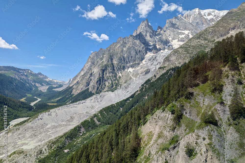 view of the mountain slope of a melted glacier on the mont blanc massif near the village of courmayeur with sunny summer weather view of the mountain slope of a melted glacier on the mont blanc massif near the village of courmayeur with sunny summer weather