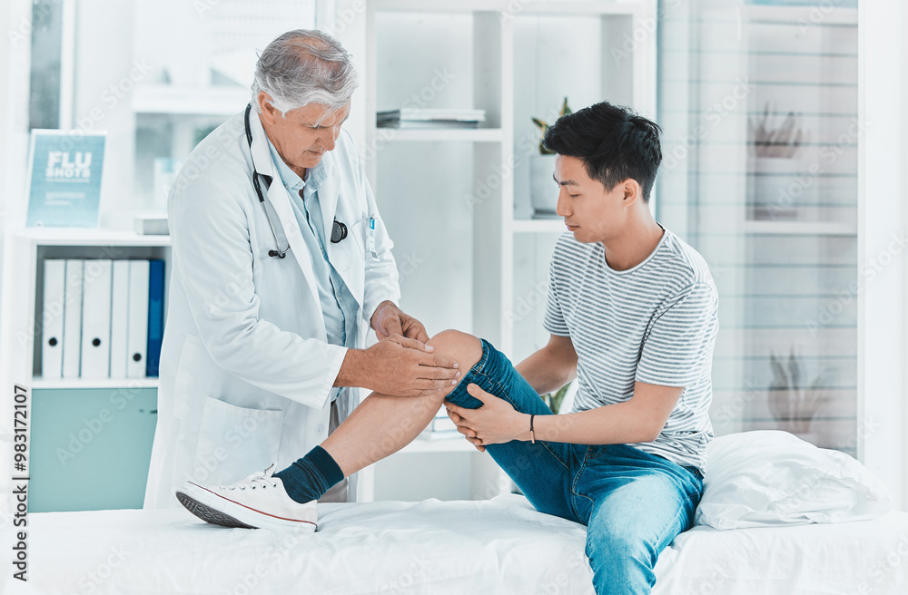 Man, doctor and patient with knee injury for physiotherapy, checkup or muscle exam at clinic. Male person, therapist or physio with client for leg pain, ache or sprain from accident at hospital Man, doctor and patient with knee injury for physiotherapy, checkup or muscle exam at clinic. Male person, therapist or physio with client for leg pain, ache or sprain from accident at hospital