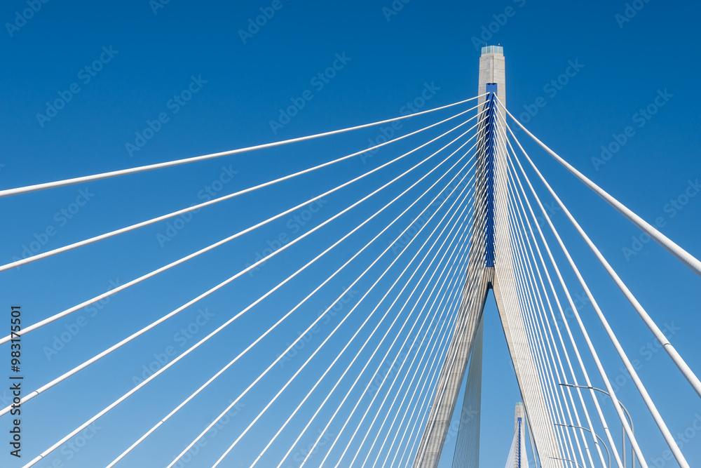 Obraz premium View on cable-stayed bridge with high pylons&nbsp;across the&nbsp;Bay of Cadiz, linking&nbsp;Cadiz&nbsp;with&nbsp;Puerto Real&nbsp;in mainland Spain