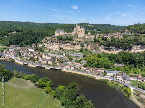 Beynac-et-Cazenac village located in Dordogne department in southwestern France with medieval Chateau de Beynac, one of most beautiful villages of France, aerial view photo