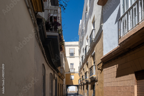 Walking through Cadiz, one of oldest cities and ports in Europe on Atlantic Ocean in southern Spain in Andalusia, tourists destination #983176909