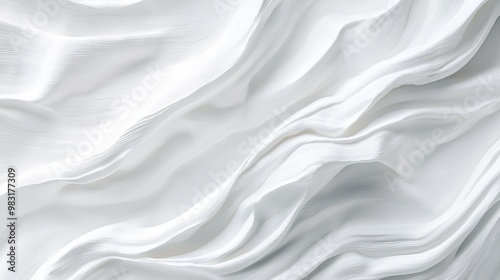  A tight shot of a white surface exhibiting undulating patterns at its top and bottom edges