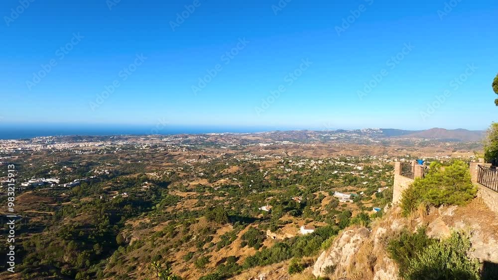 Charming white Spanish hill village overlooking the Costa del Sol, known for its white-washed buildings village in Mijas, Andalusia, Spain Charming white Spanish hill village overlooking the Costa del Sol, known for its white-washed buildings village in Mijas, Andalusia, Spain