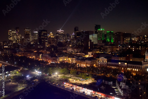 Billede på lærred Montreal skyline at night, aerial view from the old port