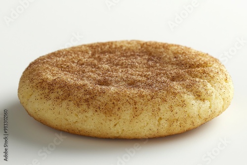 A Single Round Sugar Cookie with Cinnamon and Sugar Sprinkles