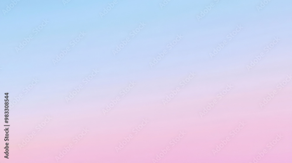 Fototapeta premium A soft gradient of pale blue transitioning into pastel pink, with seamless color transitions creating a calming and serene background.
