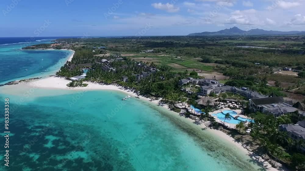 Belle Mare Luxury Beach and Hotel in Mauritius. Landscape and Indian Ocean in Background. Beautifl Beach and Clear Water. Belle Mare Luxury Beach and Hotel in Mauritius. Landscape and Indian Ocean in Background. Beautifl Beach and Clear Water.