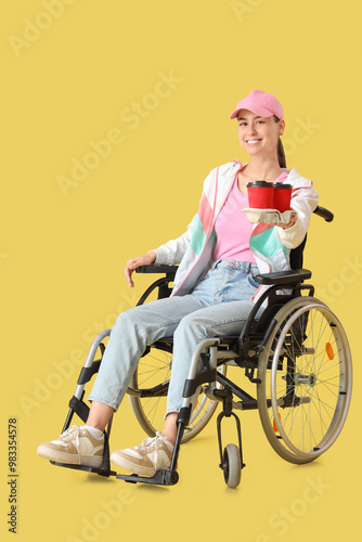 Female courier in wheelchai...