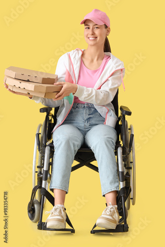 Female courier in wheelchai...