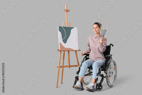 Female artist in wheelchair...