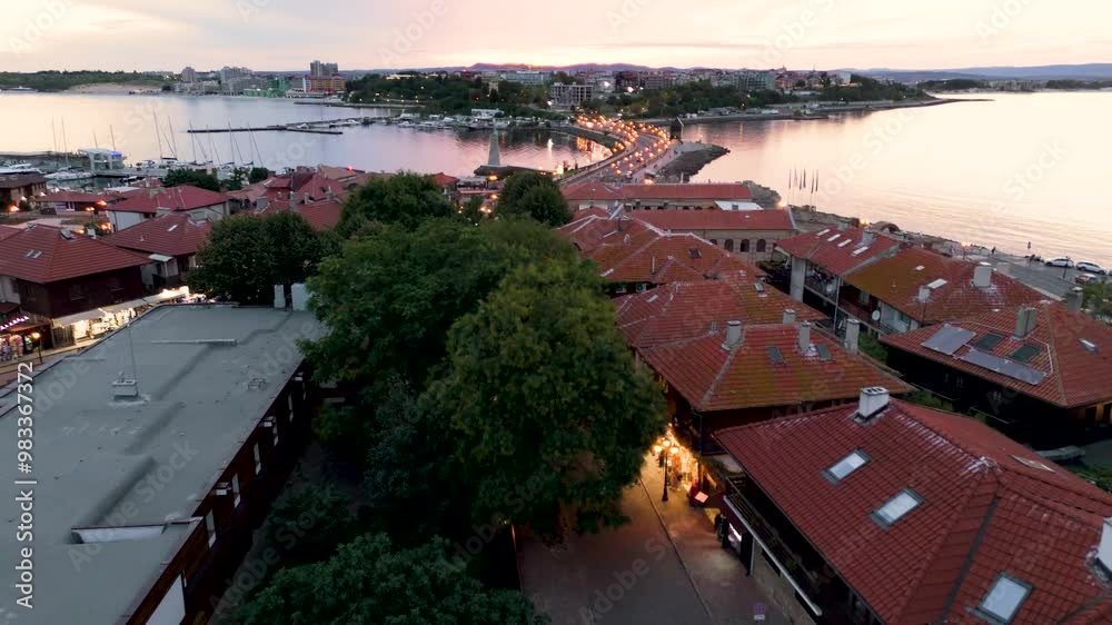 The city of Nessebar is one of the oldest cities in Europe. Top cinematic aerial view of Nessebar old town in Burgas Province. The city of Nessebar is one of the oldest cities in Europe. Top cinematic aerial view of Nessebar old town in Burgas Province.