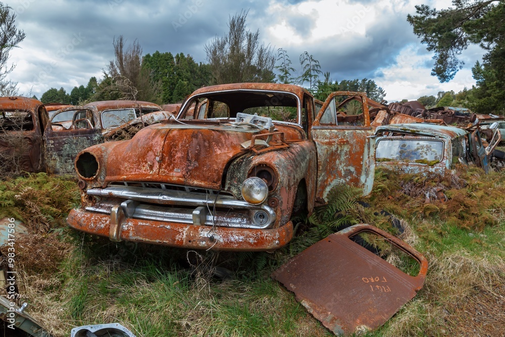 Abandoned and rusted classic cars in the The historical Horopito Motor Wreckers - Smash Palace, near Raetihi, Manawatu-Wanganui, New Zealand. Abandoned and rusted classic cars in the The historical Horopito Motor Wreckers - Smash Palace, near Raetihi, Manawatu-Wanganui, New Zealand.