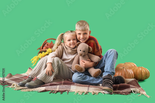 Children with toy bear and ...