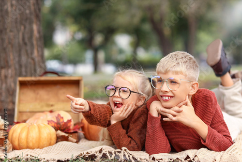 Happy children pointing at ...