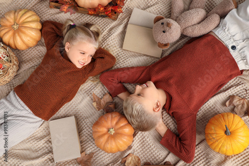 Happy children with pumpkin...