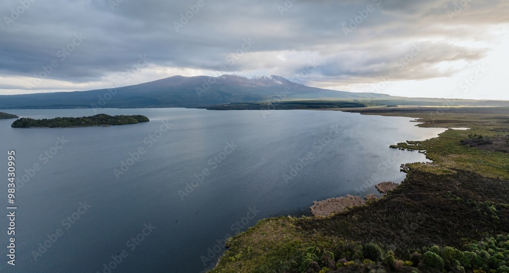 Lake Rotoaira with Mt Tongariro in the background in the Tongariro National Park. Turangi, Waikato, New Zealand. Lake Rotoaira with Mt Tongariro in the background in the Tongariro National Park. Turangi, Waikato, New Zealand.