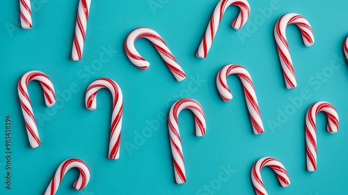 Christmas Candy Canes Pattern on Blue Background