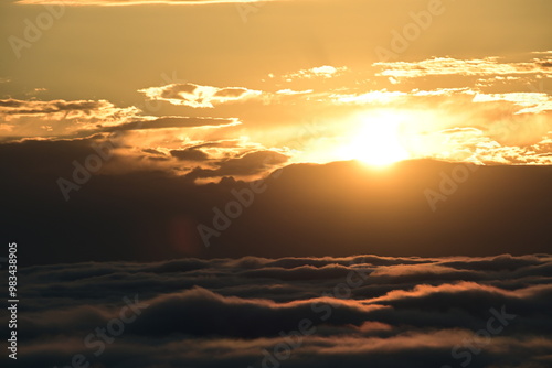 sunset over the clouds