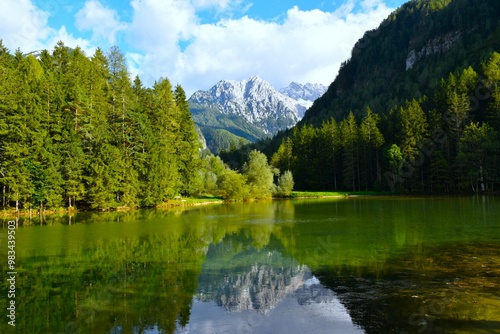 Plansarsko jezero at Zgornje Jezersko and view of Velika Baba mountain in Gorenjska, Slovenia photo
