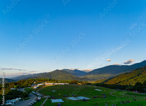 Sunrise landscape with people preparing for the hot air balloon festival at the Luye Highlands photo