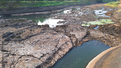 The view of the river drying up in the dry season until only small pools remain.