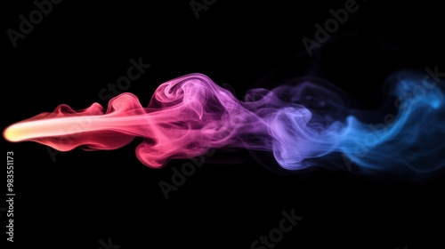 Colorful abstract smoke swirls on a black background with a sense of ethereal movement photo