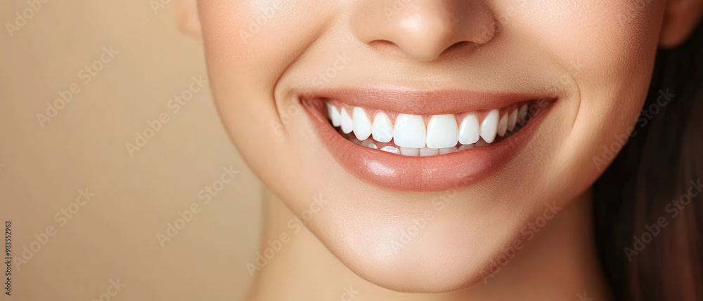 A woman with a big smile on her face, showing off her teeth. Concept of happiness and confidence A woman with a big smile on her face, showing off her teeth. Concept of happiness and confidence