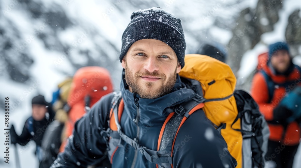A man in winter gear hiking through snowy mountains, captured mid-journey with a smile on his face, surrounded by snow-covered peaks and other hikers in the background. A man in winter gear hiking through snowy mountains, captured mid-journey with a smile on his face, surrounded by snow-covered peaks and other hikers in the background.