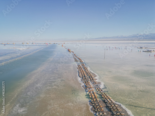 The Salt Lake of Chaka is located in Qinghai province, China. Train rails from above photo