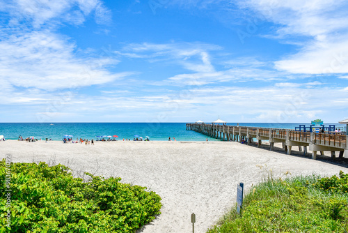 Sandy path leading to Juno Beach pier in Palm Beach County, Florida.  photo