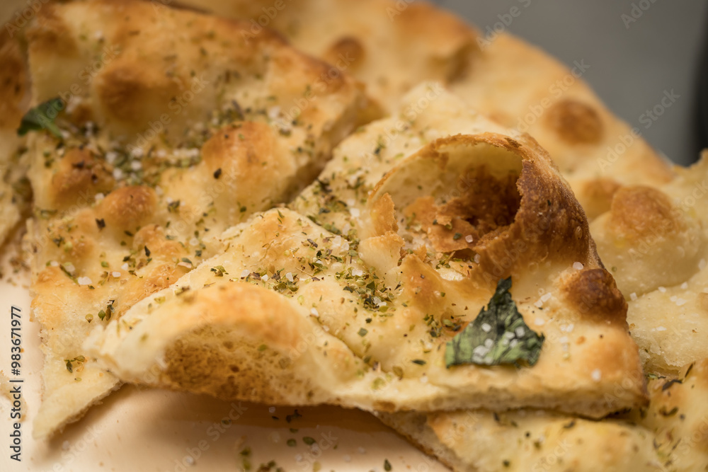 Focaccia recipe with tomatoes and aromatic herbs (rosemary, basil), with olives, garlic or feta cheese. in Transilvania, Romania, 2025, Focaccia recipe with tomatoes and aromatic herbs (rosemary, basil), with olives, garlic or feta cheese. in Transilvania, Romania, 2025,