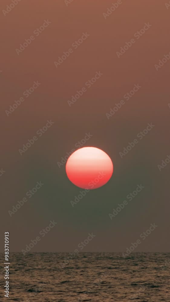 Timelapse of dramatic sunset with orange sky in a cloudy day at the ocean. Timelapse of dramatic sunset with orange sky in a cloudy day at the ocean.