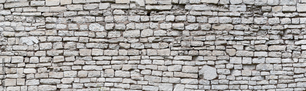 stone wall made of old cobblestones, gray brickwork background stone wall made of old cobblestones, gray brickwork background