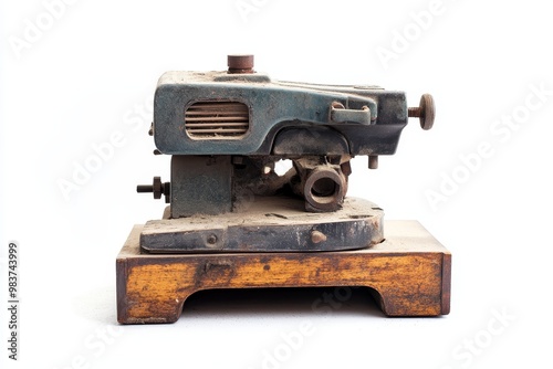 Vintage Industrial Sander Machinery, a relic of the past, stands on a wooden base, showcasing the ingenuity of industrial design.