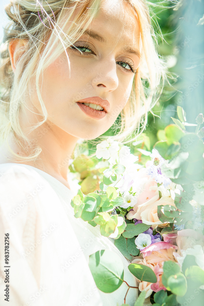 Fototapeta premium a woman with a flower in her hair and a white shirt with the word on it