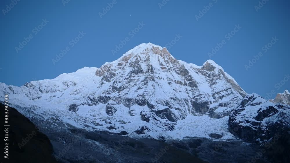 Blue Snowcapped Mountains at Night in Nepal, Snowy Himalayas Mountain Range in the Dark at Night with Snow Covered Ridge in Blue Night Time Shot of Mountain Landscape with Big Peaks and Summit Blue Snowcapped Mountains at Night in Nepal, Snowy Himalayas Mountain Range in the Dark at Night with Snow Covered Ridge in Blue Night Time Shot of Mountain Landscape with Big Peaks and Summit