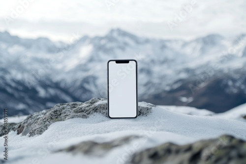 aesthetic mockup of smartphone with blank white screen on snow covered mountains background