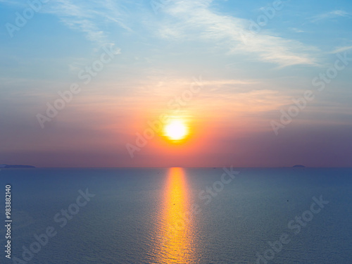 Serene Sunset Over Calm Ocean Waters