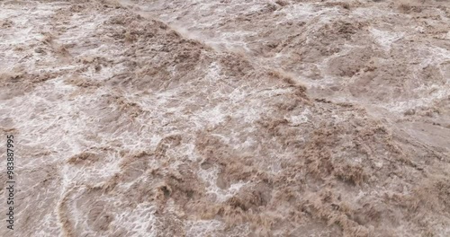 close up of flood water flowing in the river