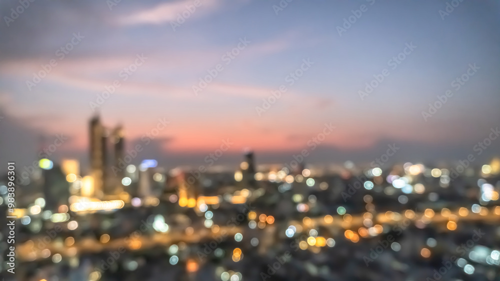 Fototapeta premium Golden hour sky with city rooftop view blur background with cityscape business corporate office building landscape blurry twilight night lights skyline nightlife bokeh for evening party